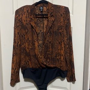 Woman’s Printed Long Sleeve Label Thong Bodysuit With shoulder Pads